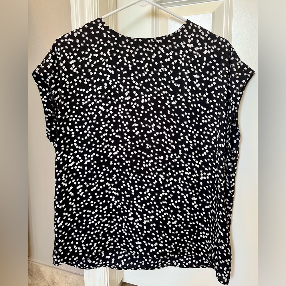Express size S like new black and white top.